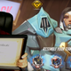Kaceytron displays a “Whore Certificate” sent to her by a fan.